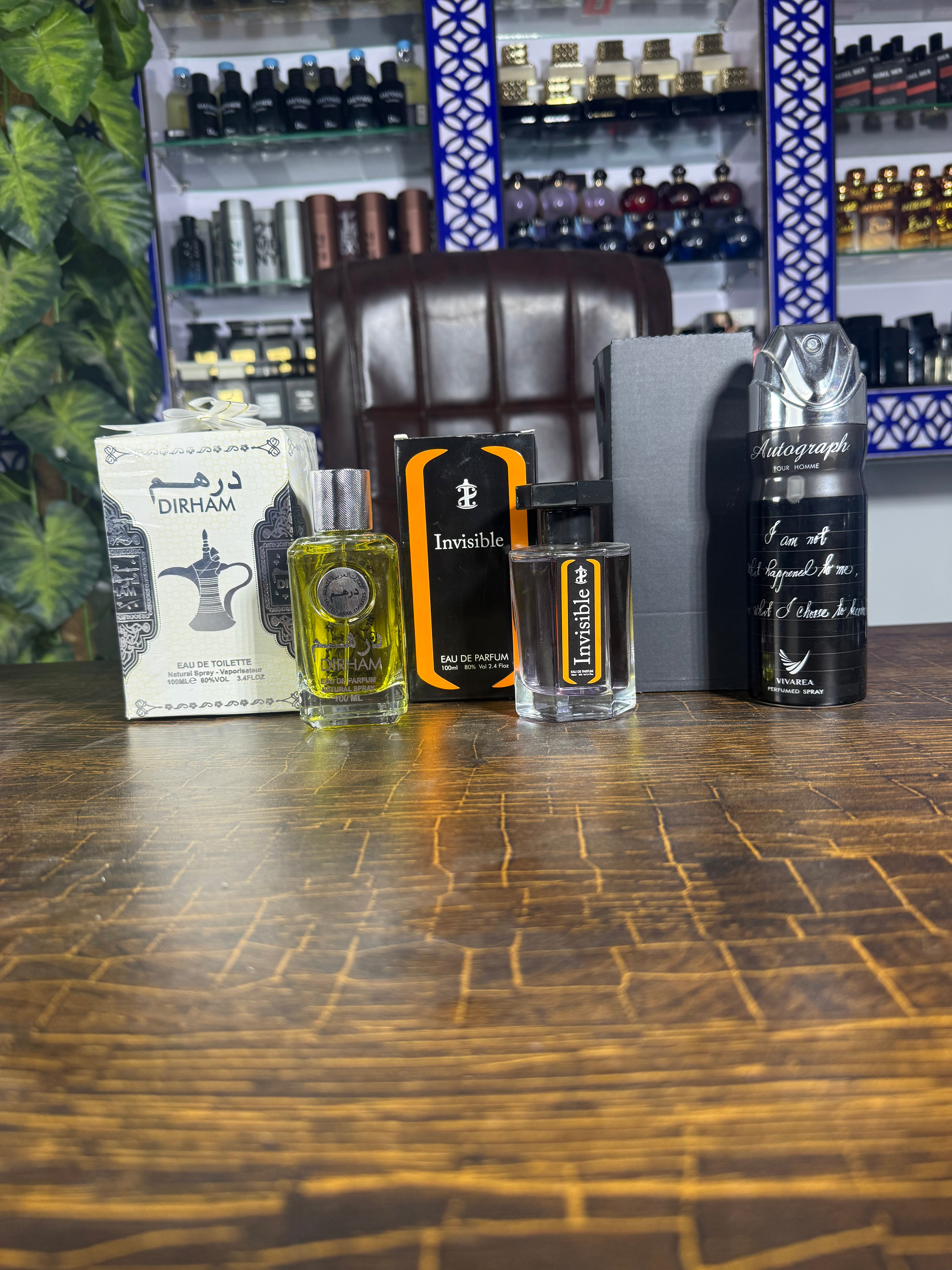 Invisible + dirham + bodyspray